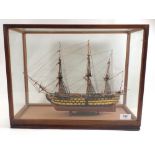 A model of a ship HMS Victory in glazed display case, 47 x 37cm