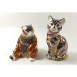 A group of two Royal Crown Derby Imari paperweights in the form of a honey bear and cat (silver