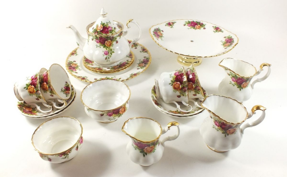 Royal Albert Old Country Roses tea and dinner ware consisting of a cake plate, teapot, four tea cups