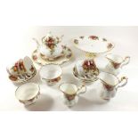 Royal Albert Old Country Roses tea and dinner ware consisting of a cake plate, teapot, four tea cups