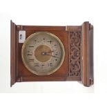 An early 20th century walnut mantel clock, 25.5cm high