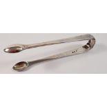 A pair of Georgian silver sugar tongs, London 1813, makers marks William Eley, William Fearn and