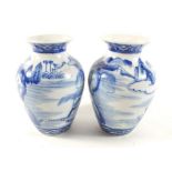 A pair of Chinese blue and white vases, 15.5cm