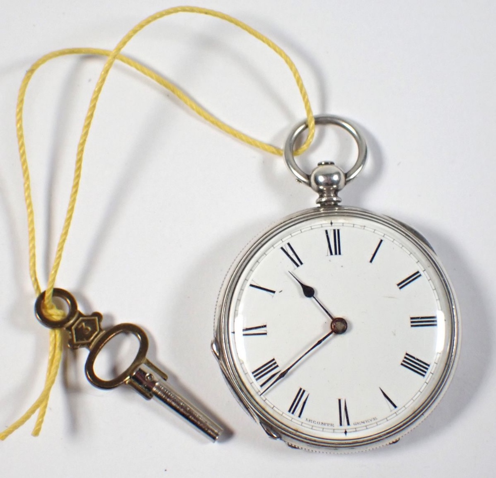 A silver cased Lecomte fob watch with engraved back 'Goldsmiths Alliance' with key