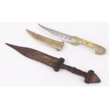 Miniature Jambiya, 4¼ ins blade, decorative brass grips in brass scabbard; together with another