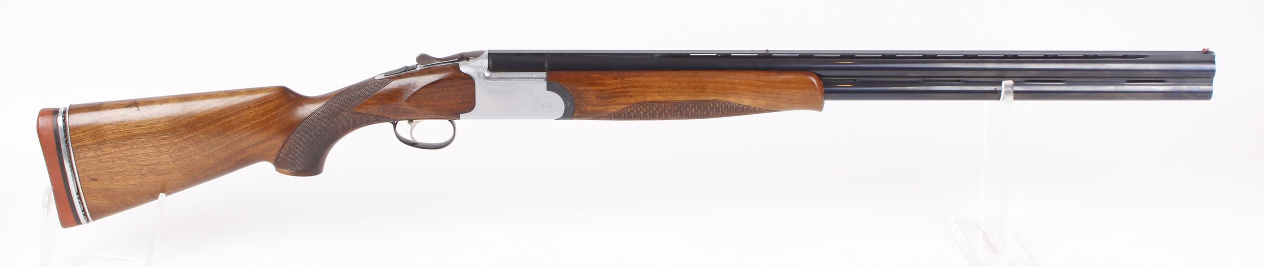 (S2) 12 bore Silma Supreme over and under, ejector, 28 ins ventilated multi choke barrels (cyl & ¼