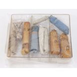 Nine early flintlock and percussion muzzle loading cartridges, various bore size
