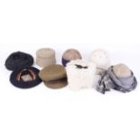 Two embroidered Indian skull caps and one other; Afhgan goat skin cap; British army field cap;