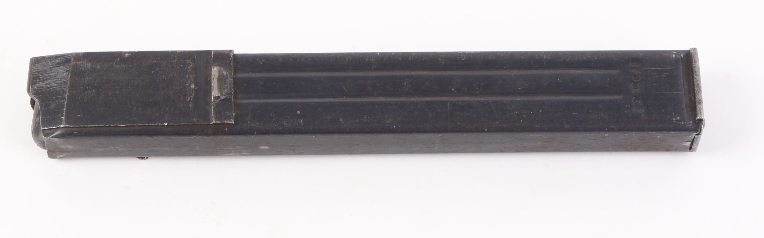 WWII: A 9mm MP38 / 40 machine gun magazine with waffenamt stamps, dated 1943