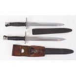 Swiss M57 bayonet, 9½ ins blade, ricasso stamped 677838, maker's mark to reverse, ribbed grips, in