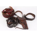 Military holster with shoulder strap, Sam Browne belt, Indian cartridge belt and one other