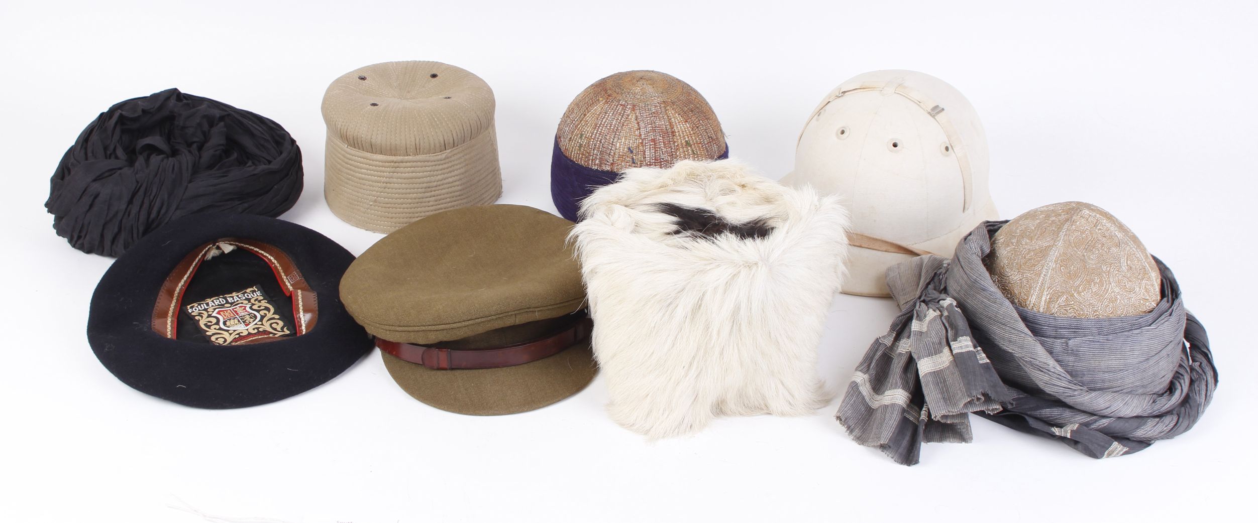 Two embroidered Indian skull caps and one other; Afhgan goat skin cap; British army field cap; - Image 4 of 4
