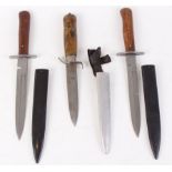 Swedish Mocara knife, 5¼ ins spear point blade stamped maker's mark, reverse quillons, wood grips,
