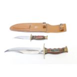 Bowie knife, 8½ ins blade, brass crossguard, stained wood grips, brass pommel, with matching 4 ins