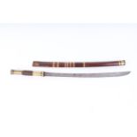Dha sword, 20¾ ins single edged curved blade, brass grip with copper link decoration, brass