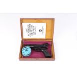 .22 Webley Tempest air pistol, in wooden box with instructions and two tins of pellets