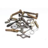 A collection of vintage case reloading tools and English and foreign powder measures