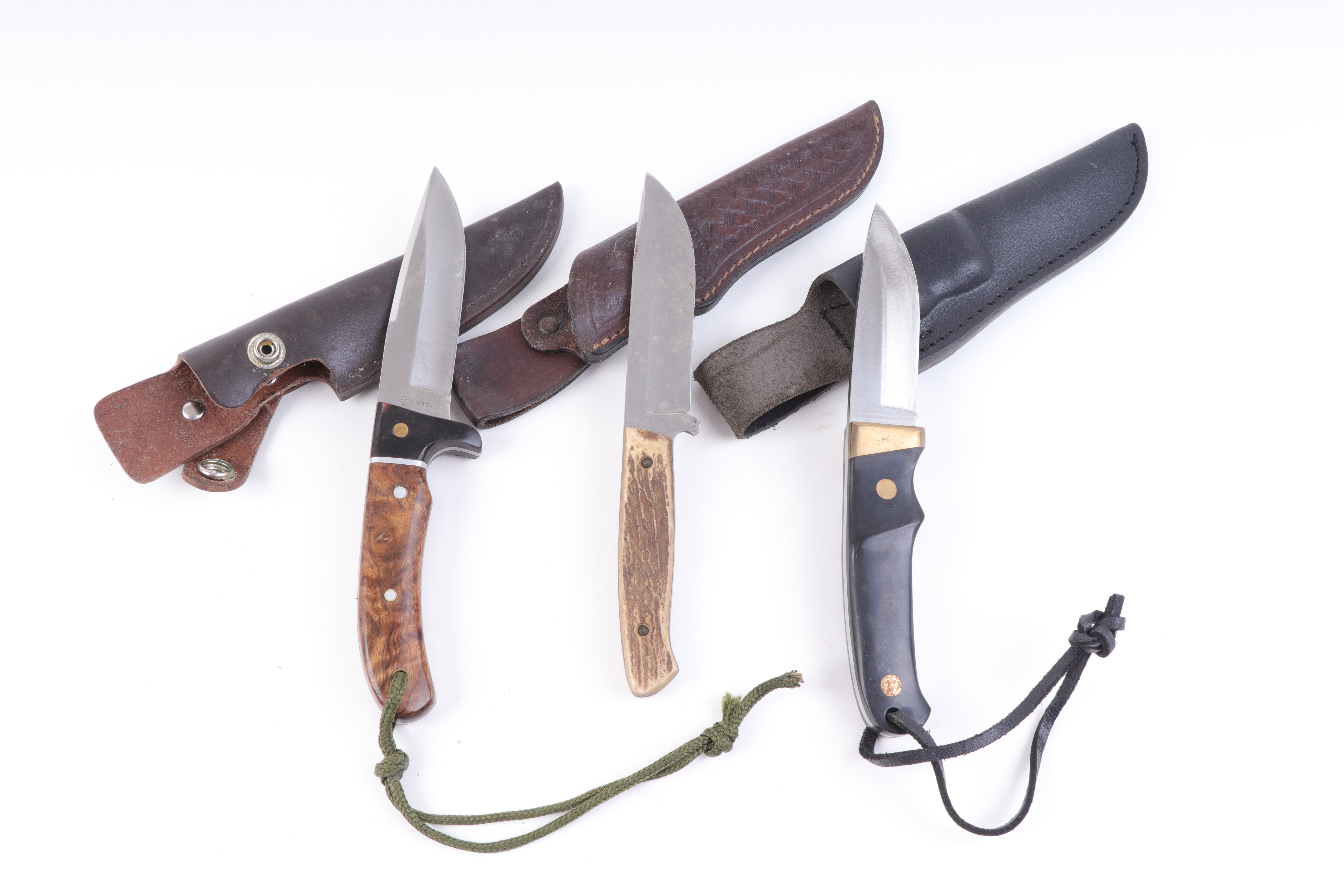 Schrade sheath knife, 3½ ins blade, slab grips, with two other sheath knives by Boker (3)