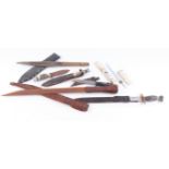 Seven various knives incl.: 4½ ins blade with ebony carved bird handle, in leather sheath, and 10¾ i