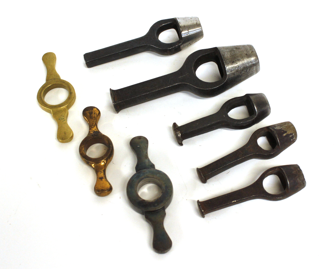 Five steel wad punches in 4; 12 and 16 bore; three brass, etc. resizers in 8 and 12 bore.