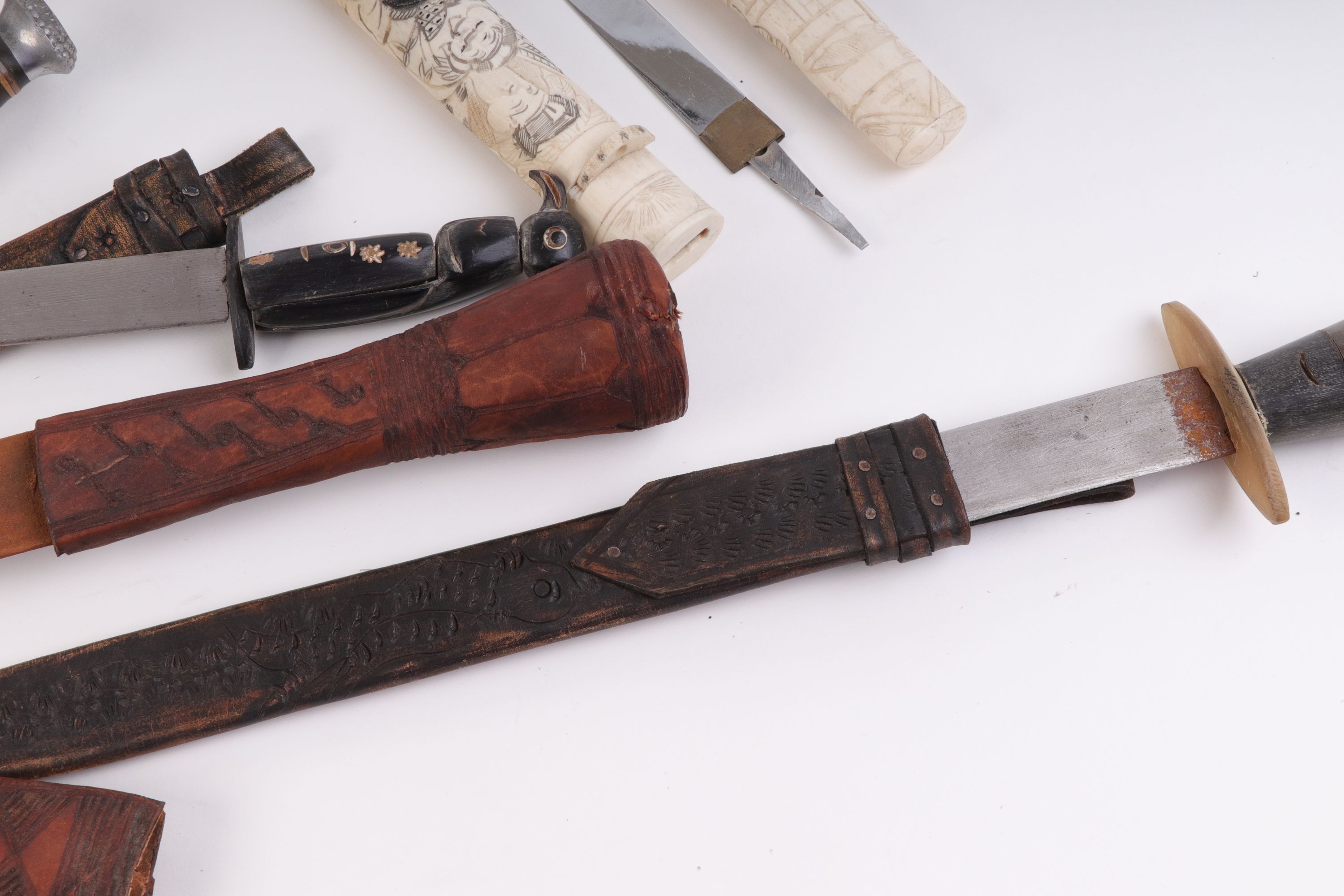Seven various knives incl.: 4½ ins blade with ebony carved bird handle, in leather sheath, and 10¾ i - Image 4 of 4