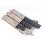 Three thompson stick magazines in military pouch