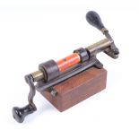 Rare block mounted brass and steel roll turn over machine for centre fire or pinfire cartridges