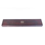 A mahogany gun case with inset brass ring handle, part fitted interior, max internal length 41½ ins,