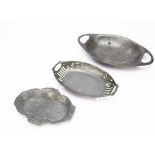 An Orivit pewter Jugendstil twin handle dish, with pierced berry design against a pierced grip and