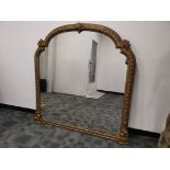 A large wooden gilt framed over mantel mirror, 149cm x 150cm