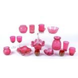 A quantity of 19th Century and later cranberry glass, to include a glass vase with raised effect,