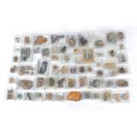 A large selection of rocks and mineral specimens, including anglesite, geotide, polomite, gypsum,