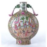 A Chinese moon flask with overglaze famille rose decoration, the twin handles of chilong form, the