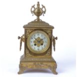 A 19th century French gilt bronze mantle clock, cream enamel dial with Arabic numerals and a pierced