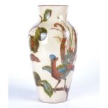 A pair of Watcombe Torquay pottery vase with sgraffito decoration of birds, depicting an exotic