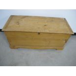 A 19th century wax pine blanket box, dovetailed body, candle box to the interior, brass carrying