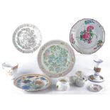 A group of predominantly European ceramics to include tin glazed earthenware plates with hand