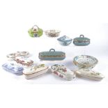 A collection of predominantly Edwardian era wash stand and dressing table pottery elongated