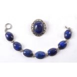 A lapis lazuli oval stone bracelet, together with a brooch (2)