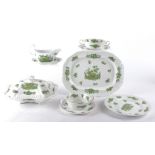 A Spode bone china part dinner service with green flowers, consisting of six dinner plates, six