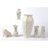 Six pieces of Irish Belleek porcelain to include a vase 'The Lagan Vase' of sinuous form, with
