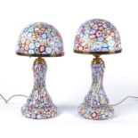 A pair of mid 20th Century Italian Murano millefiore glass lamp bases, on integral spreading