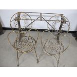 A vintage cast iron table base, with shaped end supports with a thistle design 110cm x 40cm x68cm,