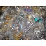 A quantity assorted costume jewellery bangles and bracelets, most individually bagged, to include