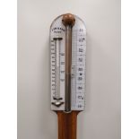 A late 19th or early 20th Century narrow stick shaped oak barometer by J. Davis & Son of Derby,