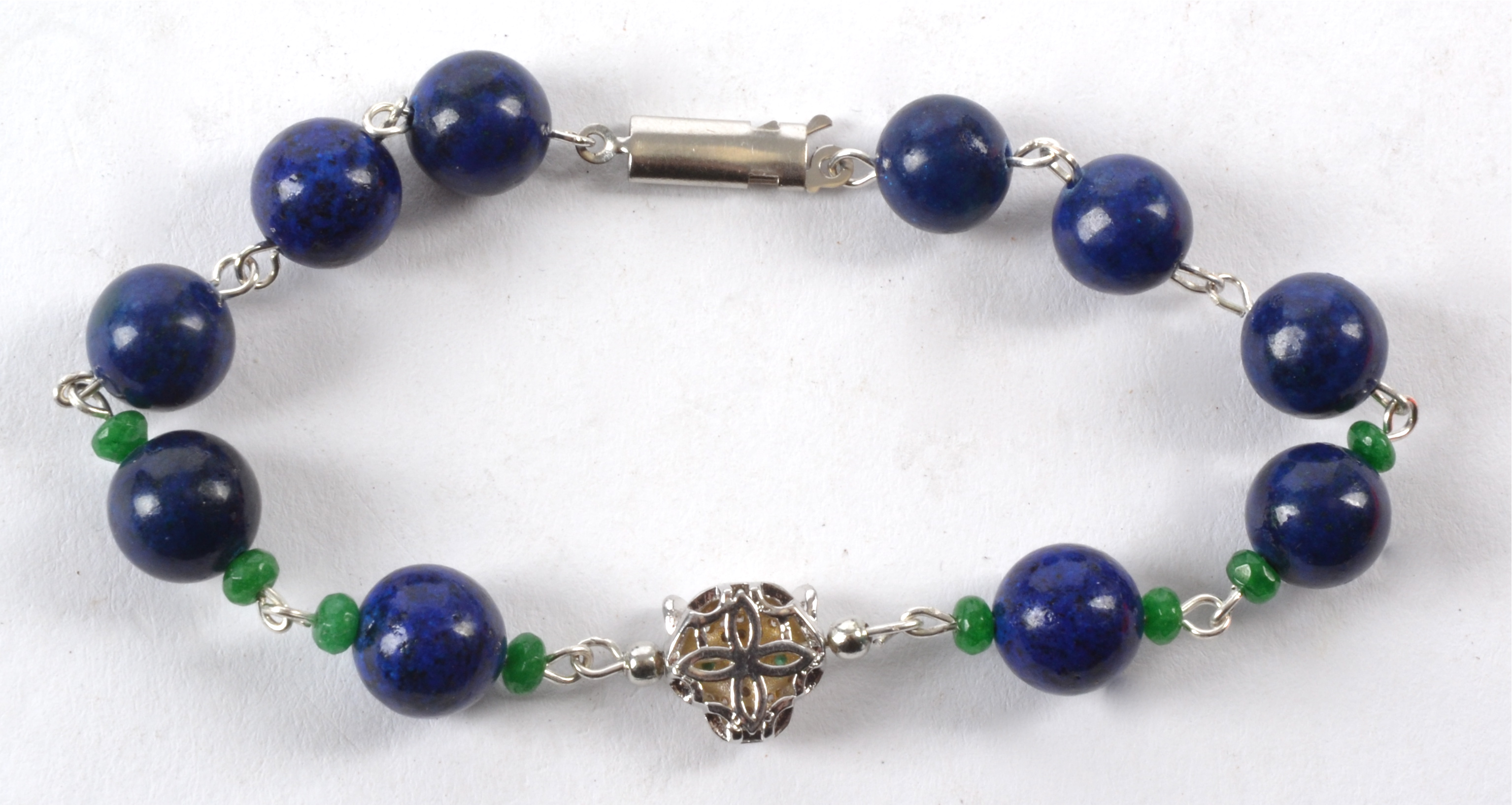 A bracelet with spherical lapis lazuli beads, with a panther's head and interspersed with - Image 3 of 3