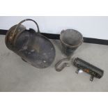 A tole helmet style coal scuttle, by B.S co and Ltd together a matching tapper holder plus antique