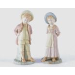 A pair of James Hadley Royal Worcester blush ivory figural shakers, probably for pounce the