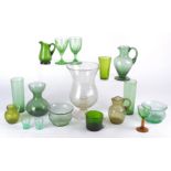 A collection of green glasses to include and example with etched fuchsia decoration, height 12cm,
