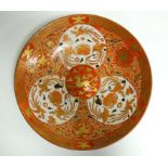 A 19th Century or early 20th Century Imari charger, probably Japanese, the raised central roundel